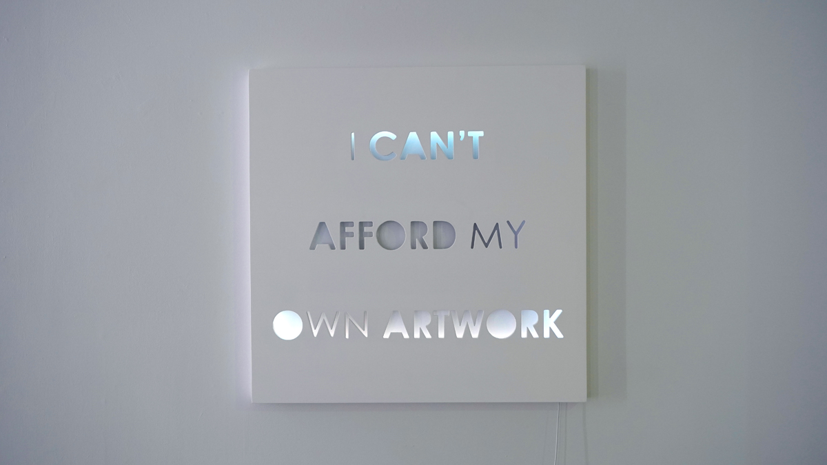 Artwork by Craig Randich that reads "I Can't Afford My Own Artwork."