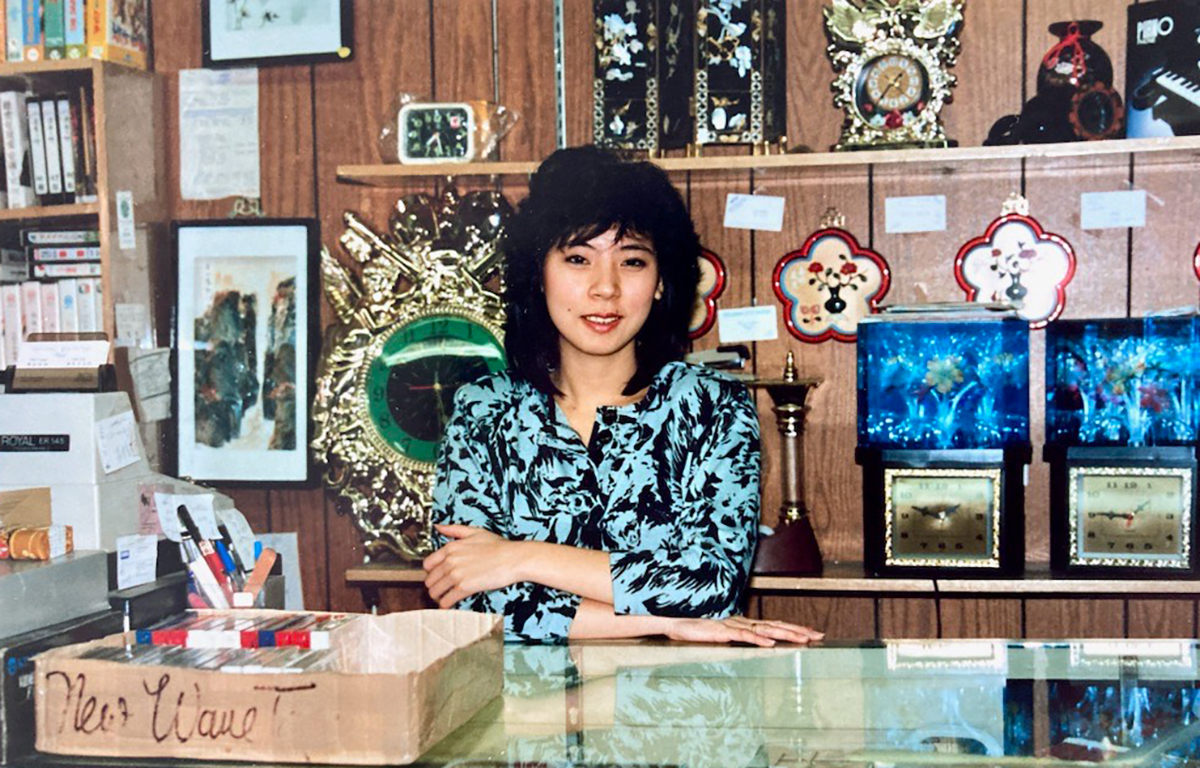 Succesful Denver boutique owner Ivy Ha, who was recently depicted in a painting by Madalyn Drewno.