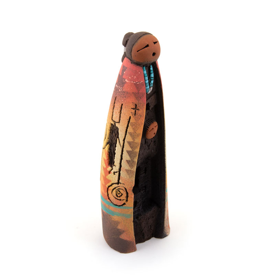 Pottery figure by John Whiterock, part of a Southwest Museum Shop Gift Guide.