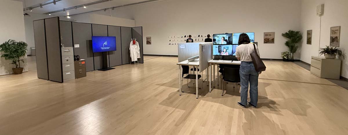 Installation view of <i>Safwat Saleem: The Unrequited Love Institute (T.U.L.I.)</i>, appearing like an office setting.