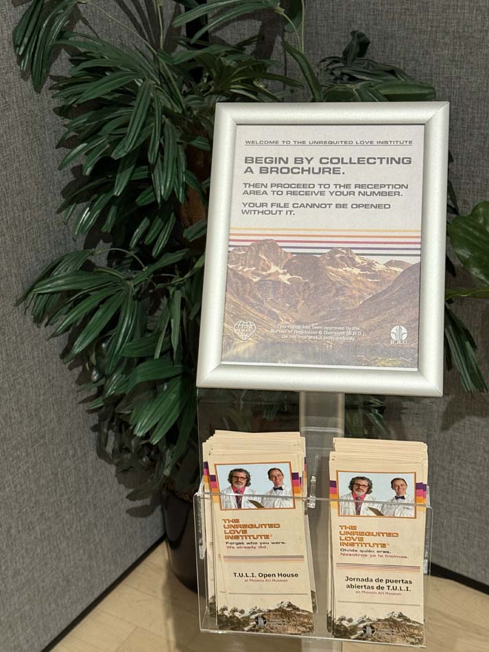 Sign and brochures for Safwat Saleem's The Unrequited Love Institute.