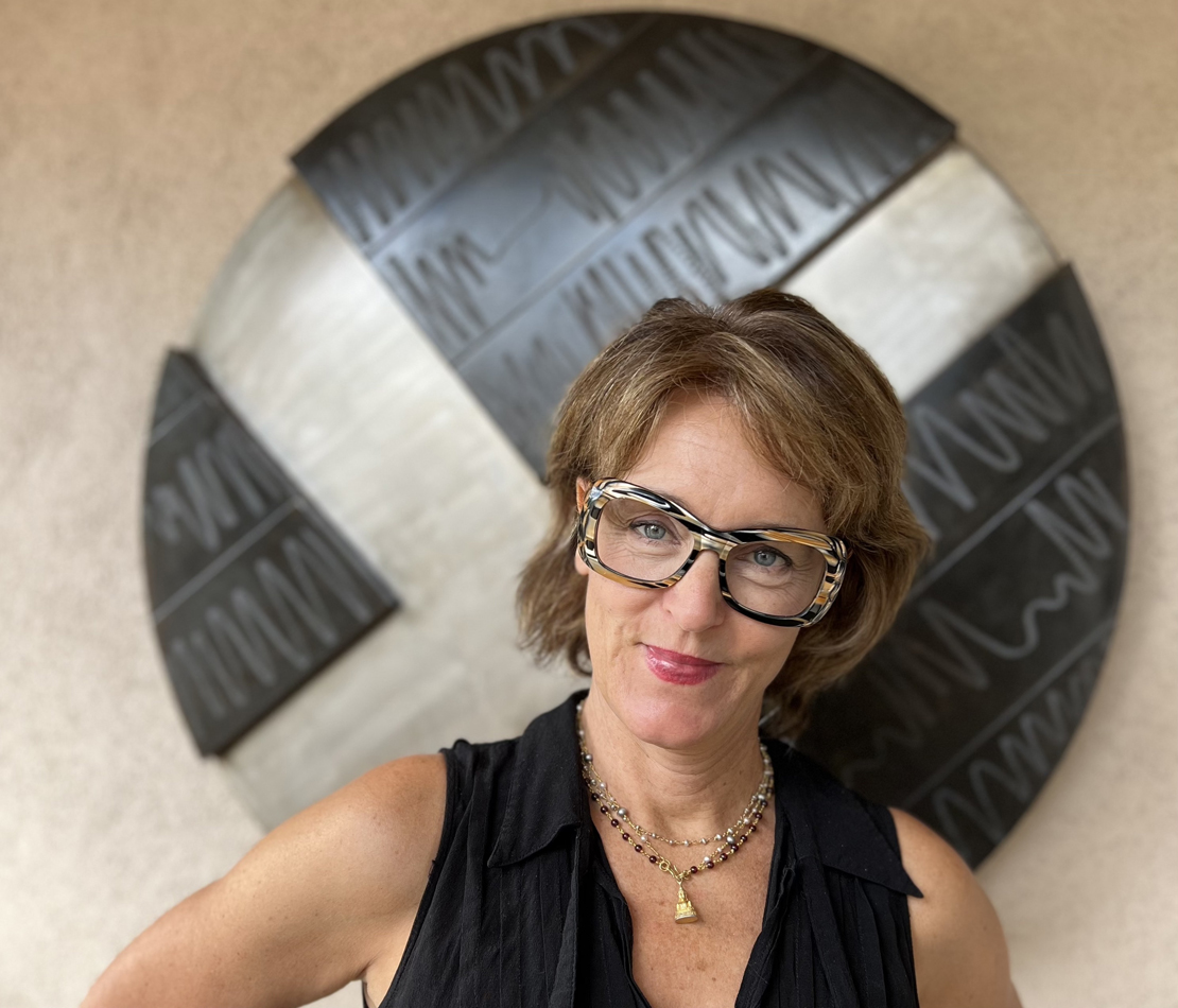 Portrait of Santa Fe gallerist Tonya Turner Carroll. She weighs in on how to price your art.
