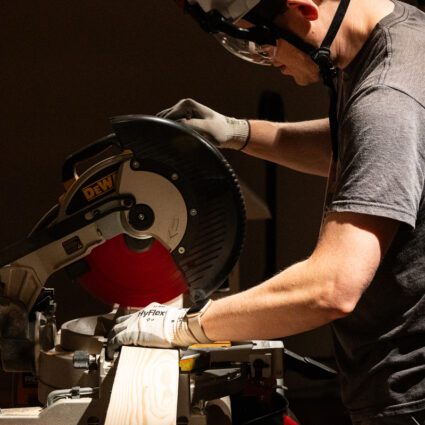 Cutting red cedar, sourced in Colorado, for Gathering Place at FAC in Colorado Springs.