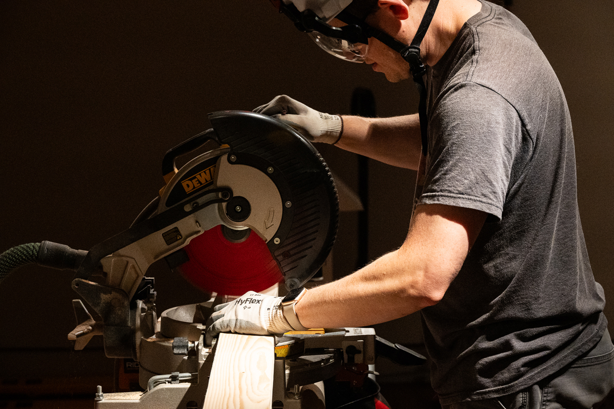 Cutting red cedar, sourced in Colorado, for Gathering Place at FAC in Colorado Springs.