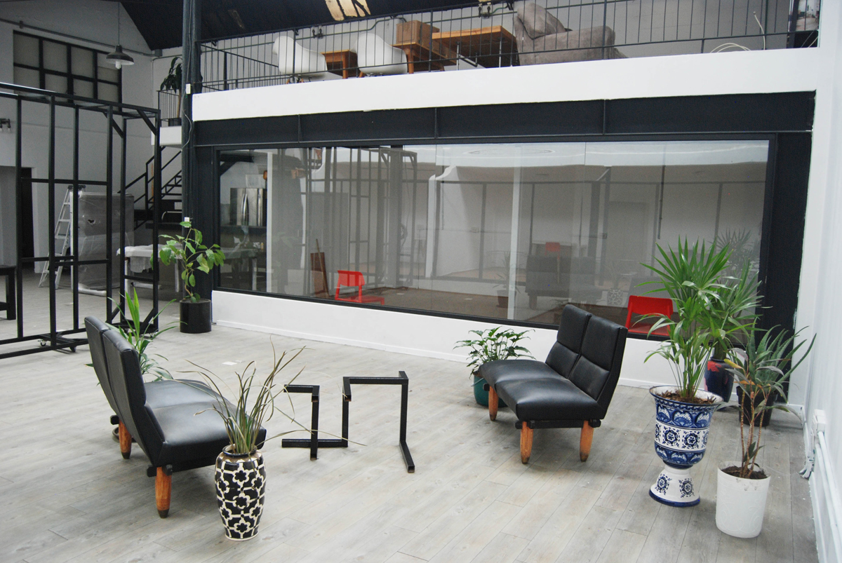 A minimal communal space in an artist residency complex. The Rondo residency is just one of the top Mexico City artist residencies on this comprehensive list for visual artists and curators.