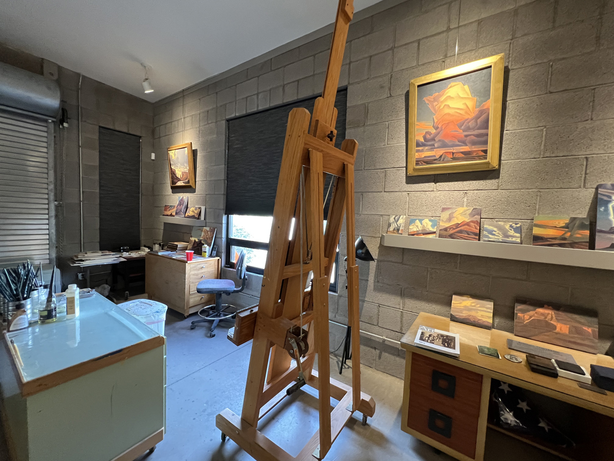 View of an easel and artworks in the Phoenix studio of painter and sculptor Ed Mell.