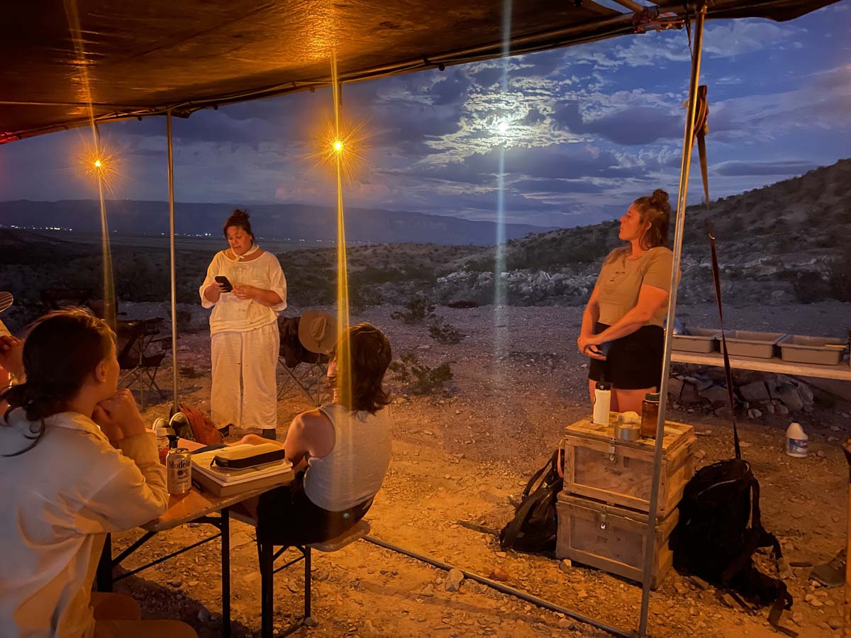 Reading aloud outside in Two Buttes, New Mexico at night.