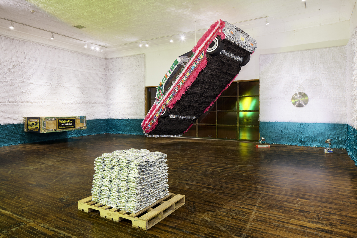 Installation view of Los Encuentros exhibition at Ballroom Marfa, featuring works by Justin Favela.