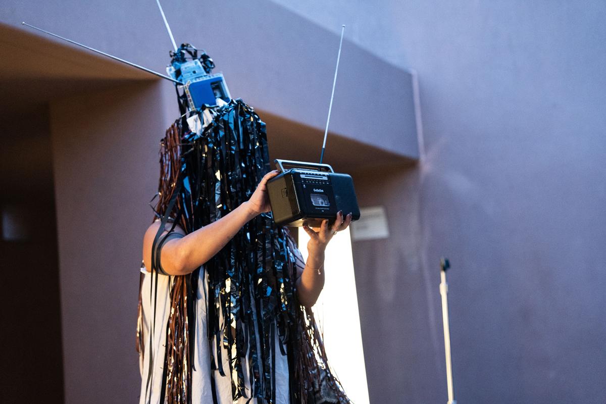 Artist Jennif(f)er Tamayo performs as part of Tierras Reimaginadas exhibition at ASU Art Museum.