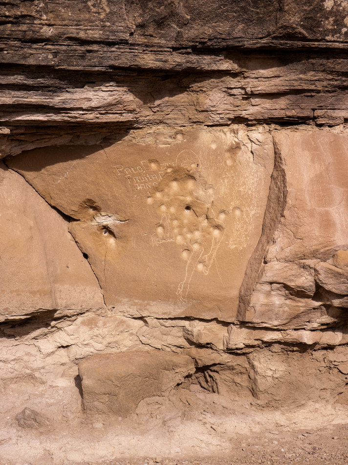 Stone carving with bullet scars by Pacomio Chacon.