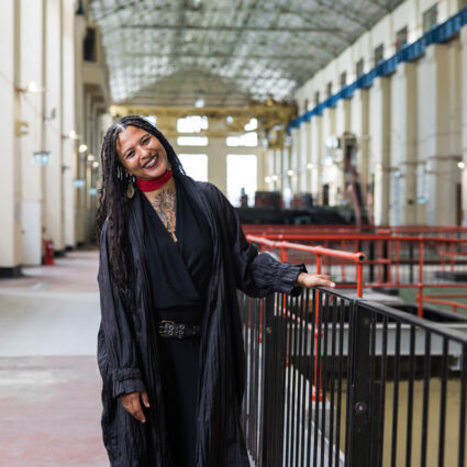 Portrait of artist Nikesha Breeze at the Biennale of Sydney. Breeze comments on international biennial artists costs.