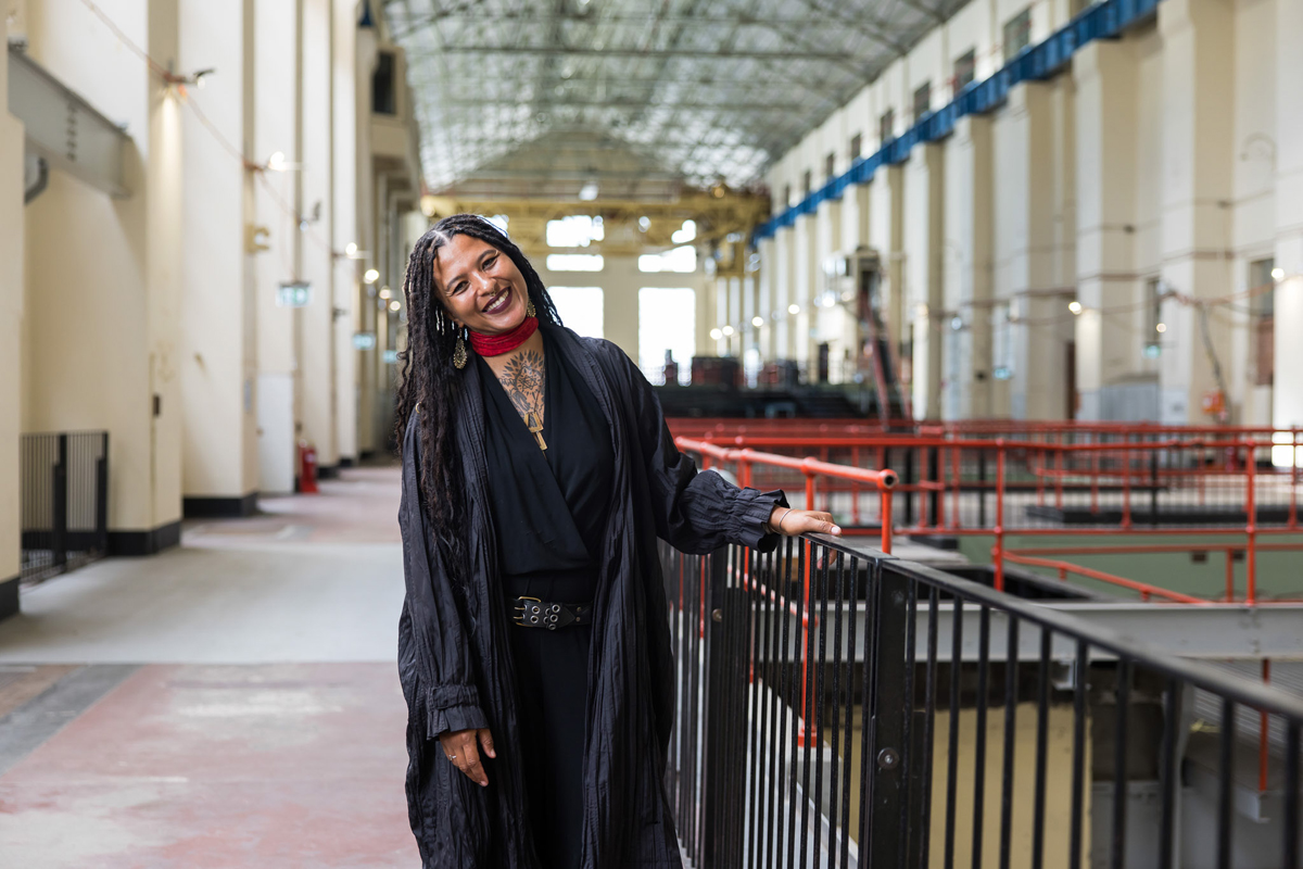 Portrait of artist Nikesha Breeze at the Biennale of Sydney. Breeze comments on international biennial artists costs.