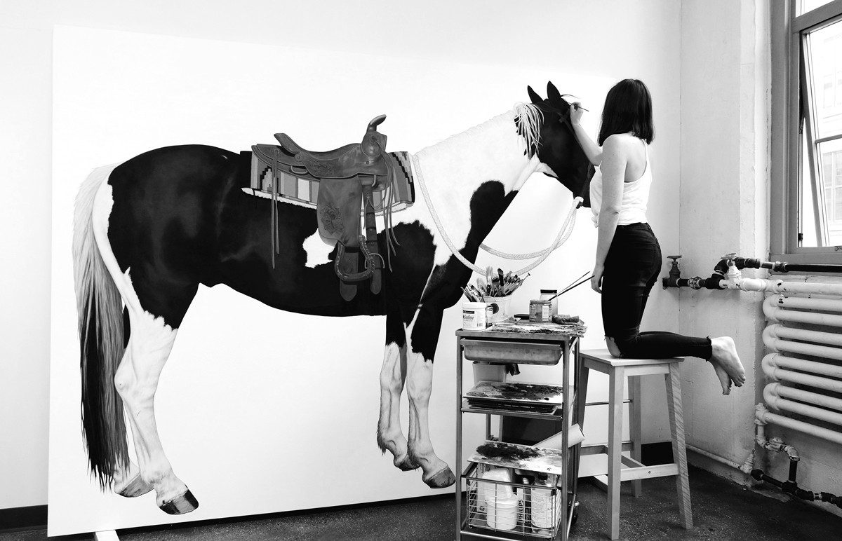 Portrait of artist Lara Nickel, who comments on international biennial artists costs.