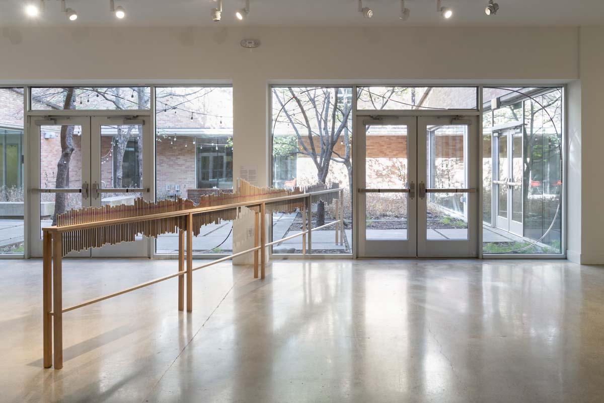 Installation view with the work rain score and the windows of the VAC