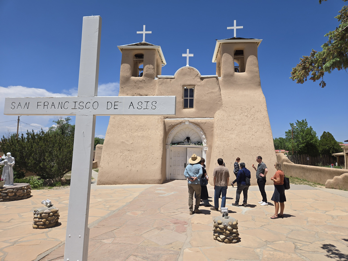 The featured artists for the group exhibition Unearthing Futures visit a historical church in Taos.
