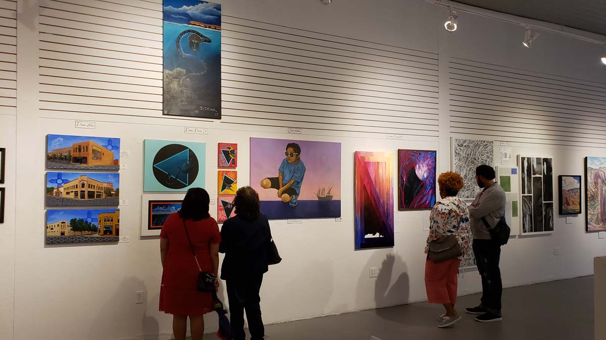 Visitors explore Art123 gallery in downtown Gallup.