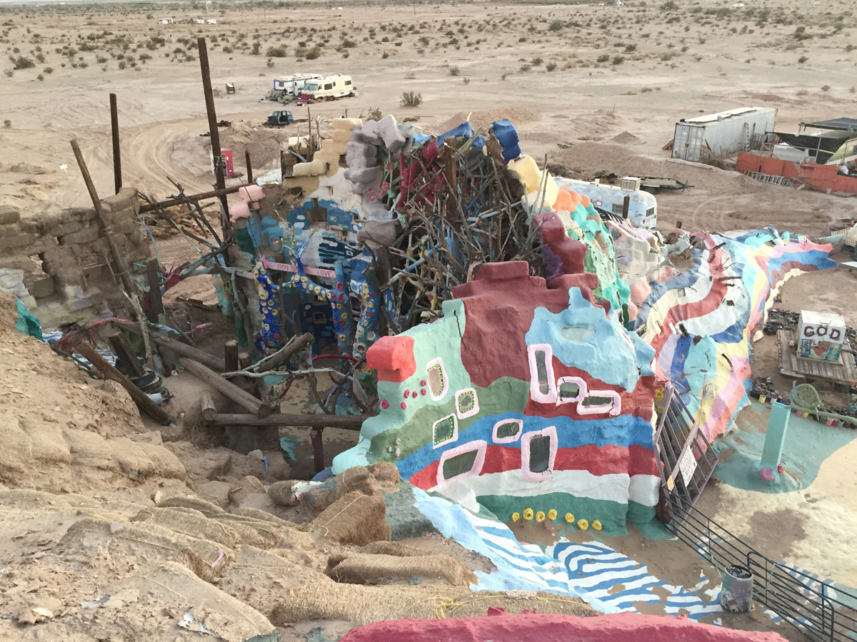 Aerial view showing the internal architecture of Leonard Knight's Salvation Mountain in the California desert.