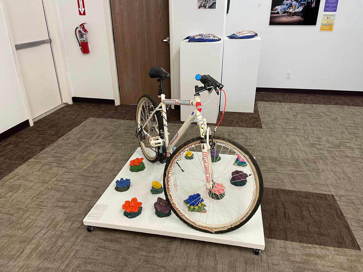 An adorned bicycle by Leonard Knight of Salvation Mountain.