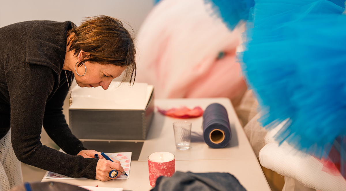 Portrait of Colorado-based, Argentinian artist Ana María Hernando at work in her studio.