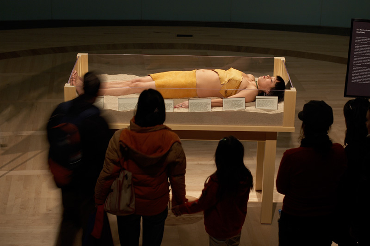 Performance still of Erica Lord's Artifact Piece, Revisited, at National Museum of the American Indian. She will perform it again at Site Santa Fe in 2026.