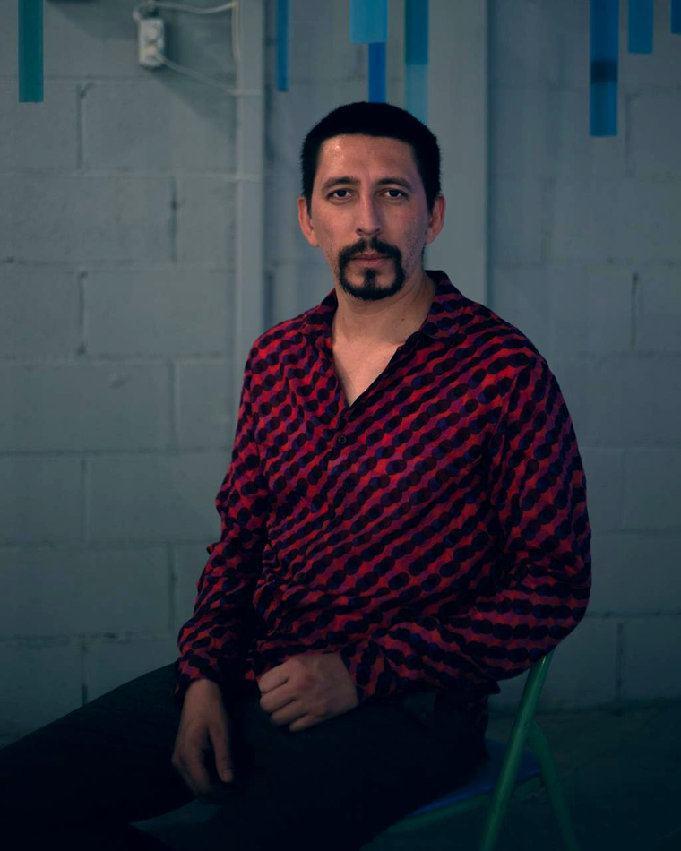 Portrait of artist and curator Edgar Picazo Merino, who founded the binational art encounter Sutura.