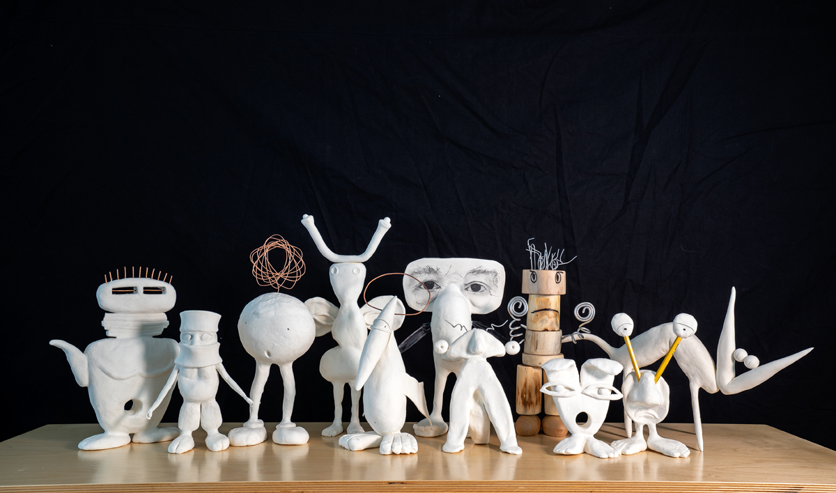 A grouping of surreal figurative sculptures.
