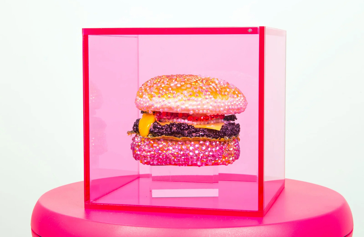Bedazzled cheeseburger sculpture by Vita Kari from The Rest is Drag at 516 Arts.