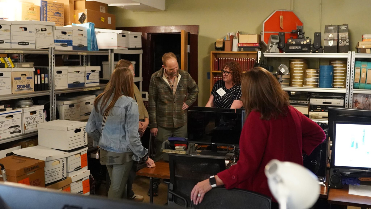 Portrait of Texas Archive of the Moving Image staff in action.