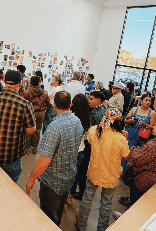 Crowd at an art opening in El Paso, Texas.