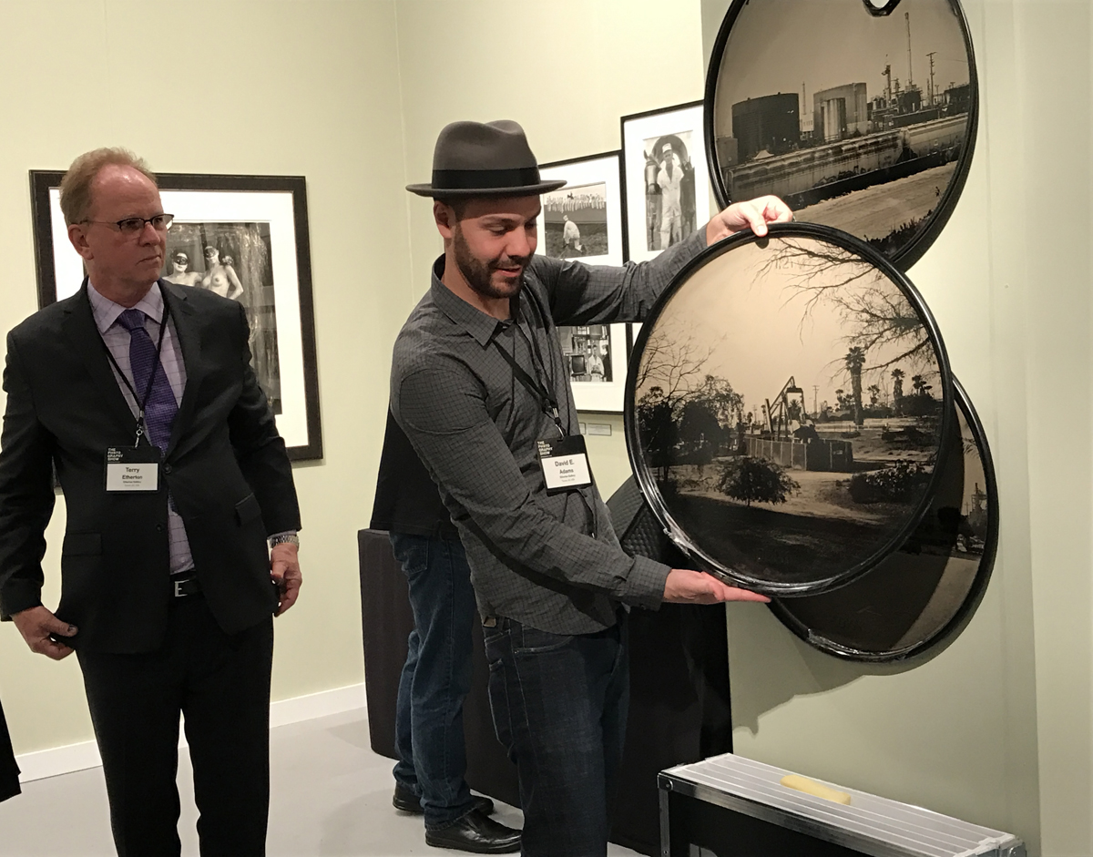 Portrait of photography dealer Terry Etherton with artist David Emmett Adams.