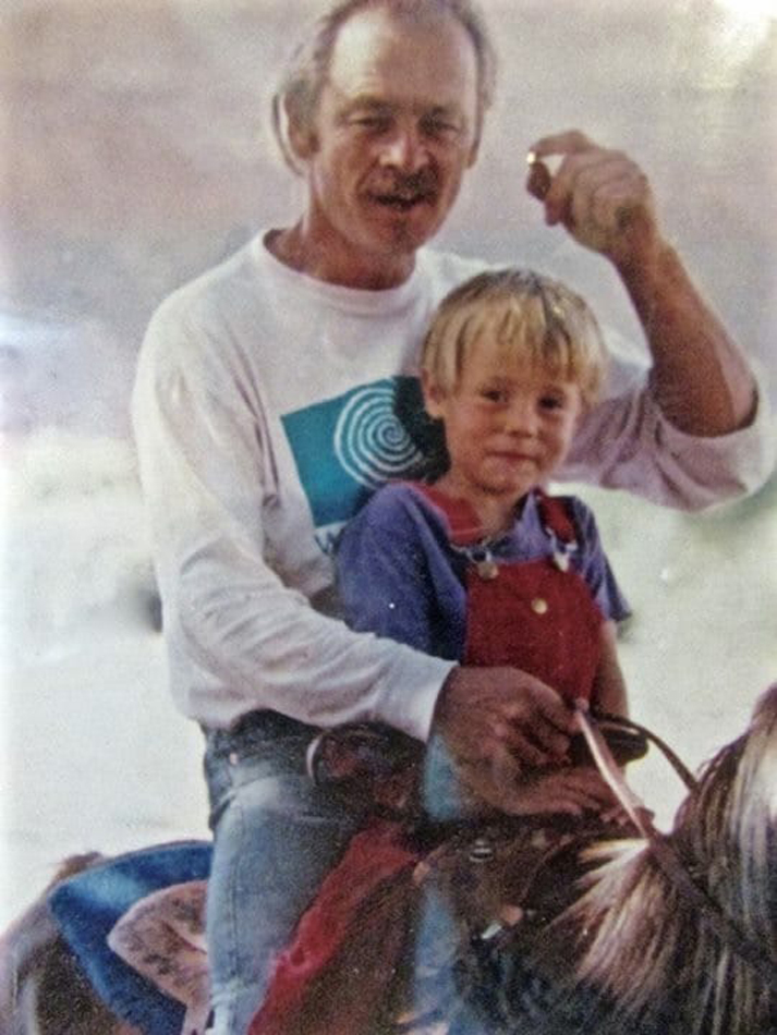 Portrait of artist Joe Pachak with his son Raini.