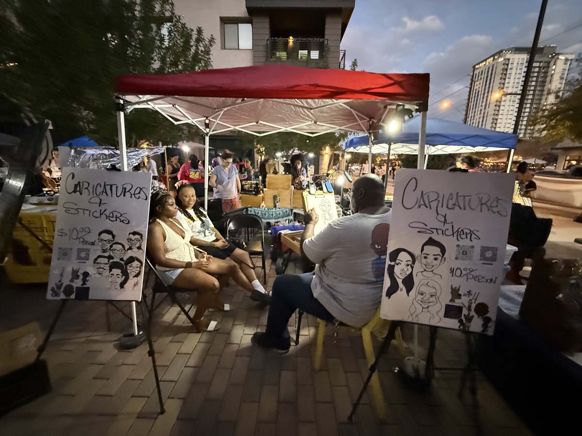 Caricature artist during Central Arts Market at Roosevelt Row Apartments on Roosevelt St.