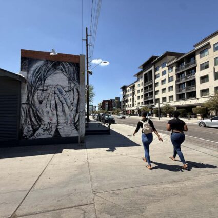 Early hours of September's First Friday facing west on Roosevelt St. Mural by Hugo Medina.