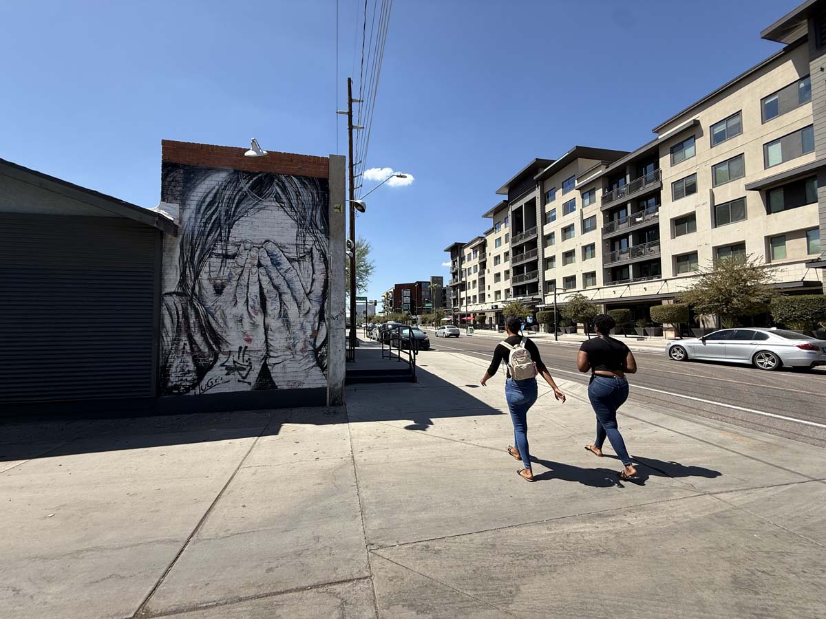 Early hours of September's First Friday facing west on Roosevelt St. Mural by Hugo Medina.