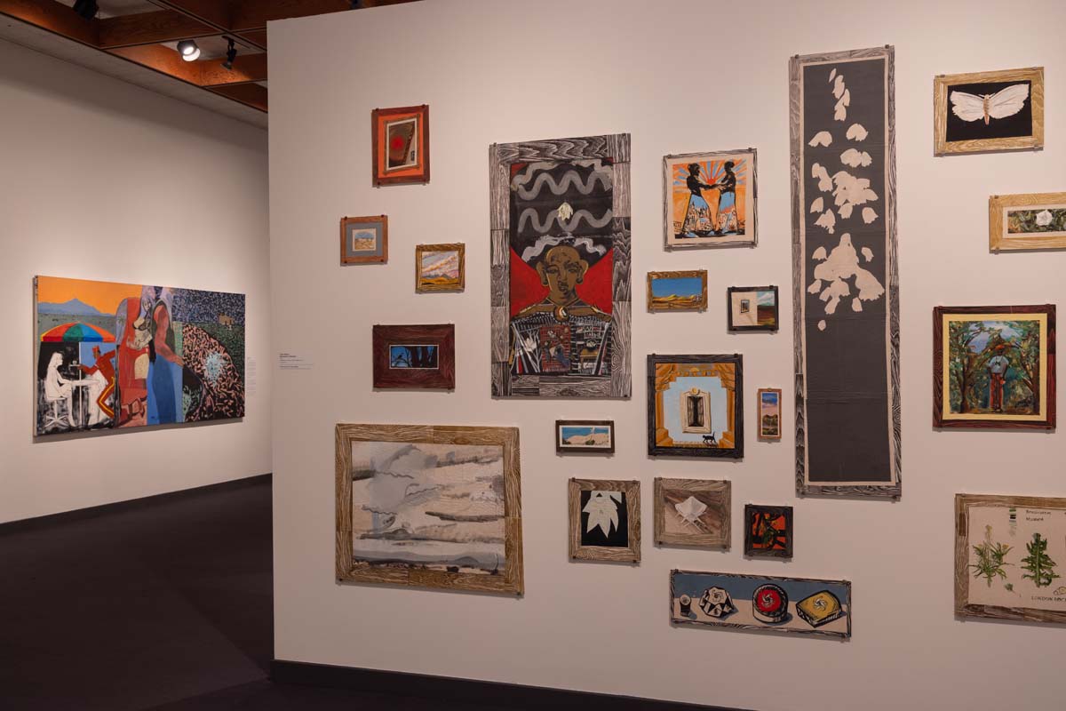 The Woods Before Sunrise installation view, with Paula Wilson's Naturalist's Collection in the foreground, and Maurice Burns's Galisteo Fantasy in the background