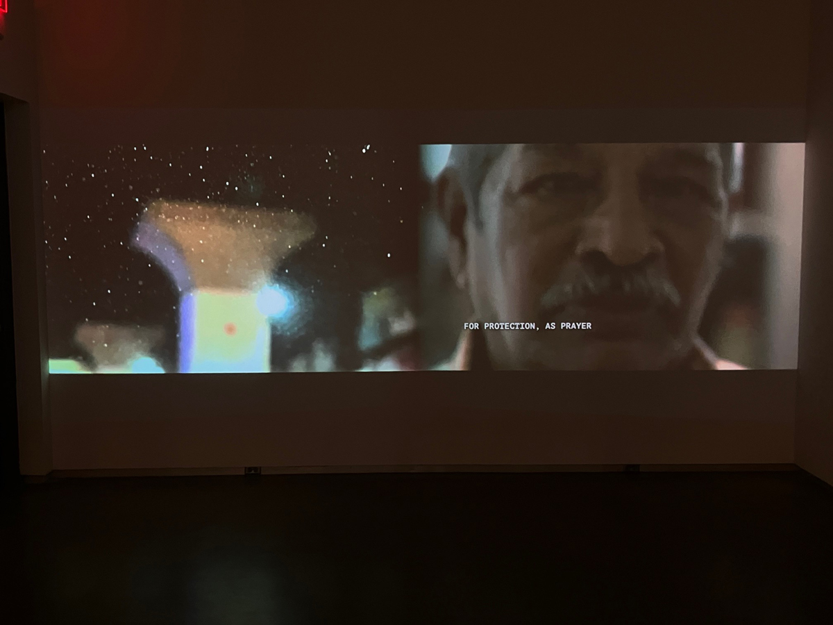 Installation view of a two-channel video installation by Sindhu Thirumalaisamy at the Lilley Museum in Reno, Nevada.
